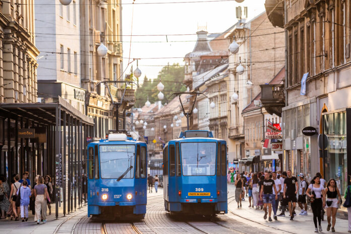 Blue Trams and Evening Crowds on Ilica Street in Zagreb, Croatia Blue Trams and Evening Crowds on Ilica Street in Zagreb, Croatia