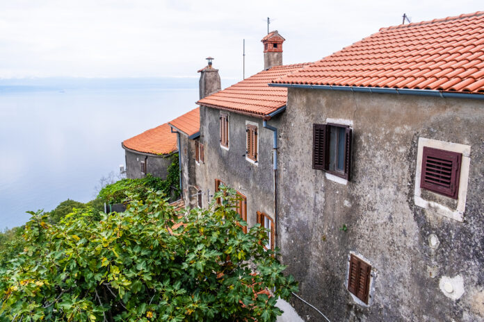 Traditional Houses in Mošćenice Overlooking the Adriatic Sea Traditional Houses in Mošćenice Overlooking the Adriatic Sea