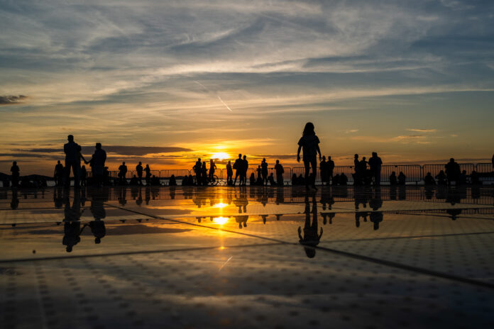 Capturing the Sunset Reflections at the Monument to the Sun in Zadar Capturing the Sunset Reflections at the Monument to the Sun in Zadar